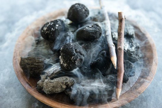 Plating like the dark nemesis of Donna Hay: Charcoal-dusted chocolate truffles.