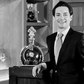 Morgan de Prémorel with the elaborately packaged Louis XIII bottle.