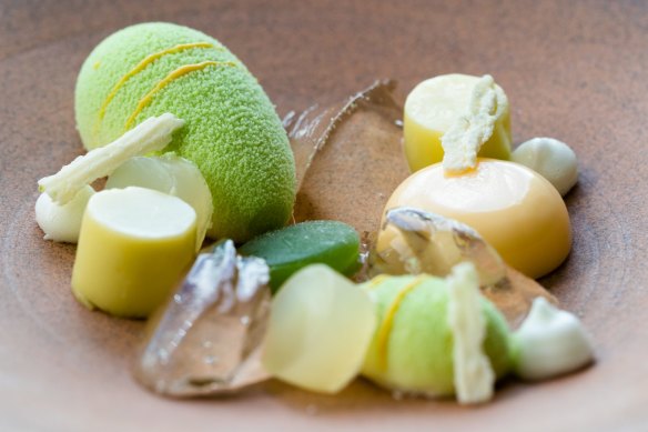 A Gin and Tonic dessert with 14 elements flavoured with gin, lime, and white chocolate.