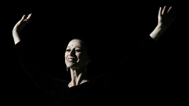 Maya Plisetskaya welcomes spectators during a performance in her honour at the Kremlin Palace in Moscow in 2005.