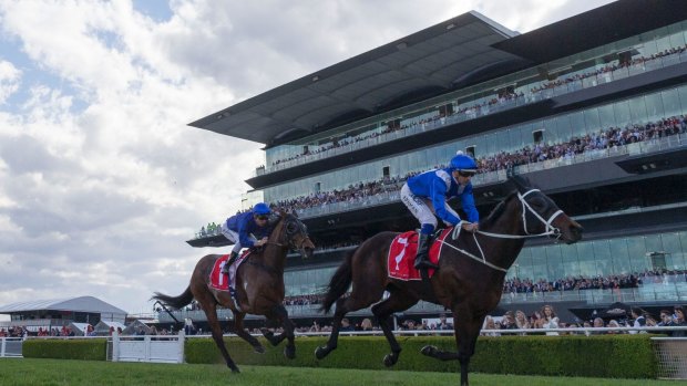 Easy in the end: Winx ridden by Hugh Bowman wins the Colgate Optic White Stakes.