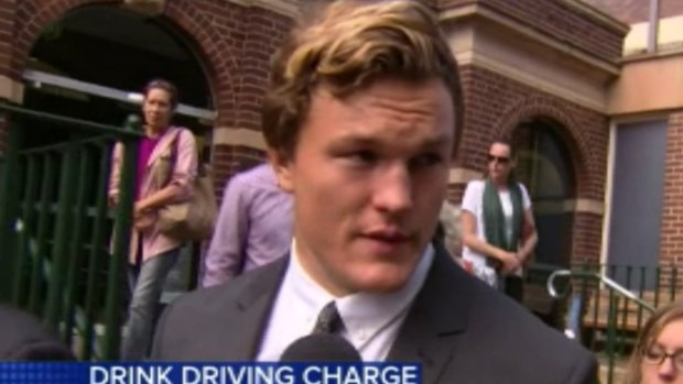Aerogard fail: Liam Knight leaves court after pleading guilty to drink driving charges.
