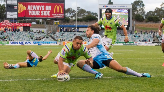 Try time: Josh Papalii scores against the Titans at Canberra Stadium.
