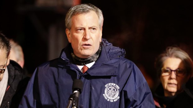 New York City Mayor Bill de Blasio speaks during a news conference after the fire.