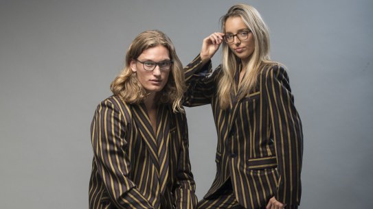 Shelby Green and Jack Moran model Chris Ran Lin outfits. 