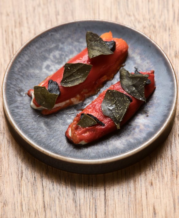 Piquillo peppers with goat's cheese and black garlic.