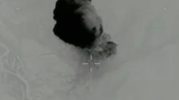 The US Department of Defence shows a plume of smoke rising from a bomb dropped in Afghanistan. 