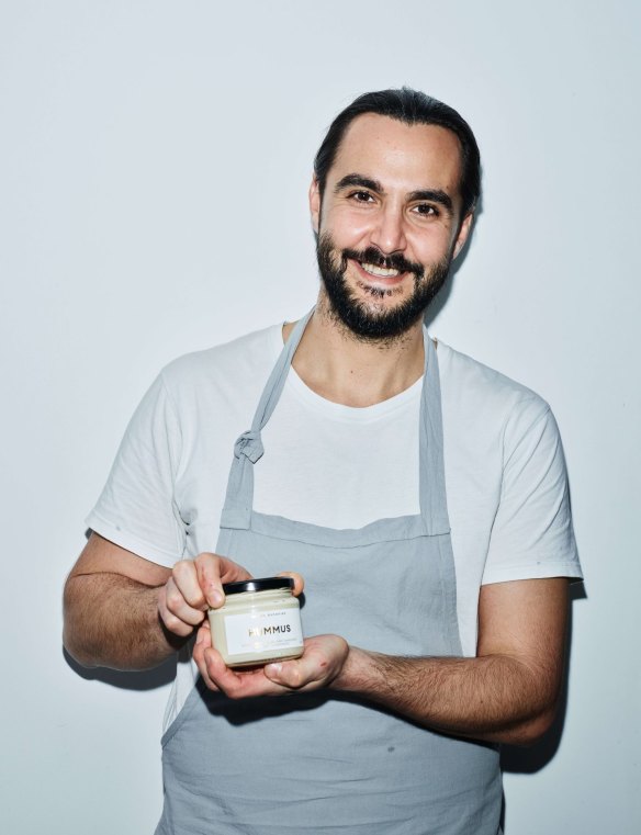 Chef Tom Sarafian with his signature hummus. 