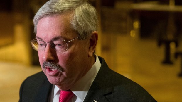 Iowa Governor Terry Branstad speaks to members of the media in the lobby of Trump Tower in New York.