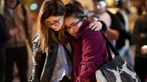 Members of the public at a vigil for the victims of the terror attack at the Ariana Grande concert in Manchester. The victims were primarily girls and women.