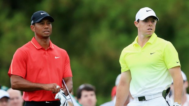 Made it: Rory McIlroy with childhood hero Tiger Woods during the final round of the 2015 Masters Tournament.