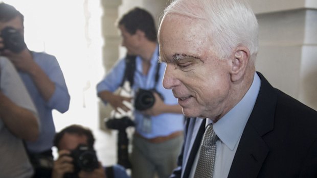 Senator John McCain, a Republican from Arizona, exits the US Capitol after voting on the Senate floor in Washington, DC.