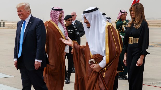 President Trump and Melania Trump are welcomed by Saudi King Salman at the Royal Terminal of King Khalid International Airport.