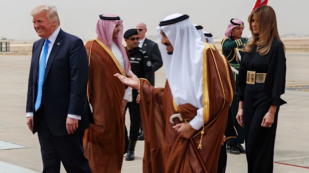 President Trump and Melania Trump are welcomed by Saudi King Salman at the Royal Terminal of King Khalid International Airport.