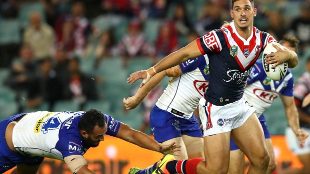Clean break: Rooster Ryan Matterson splits the Bulldogs' defence on Thursday night.
