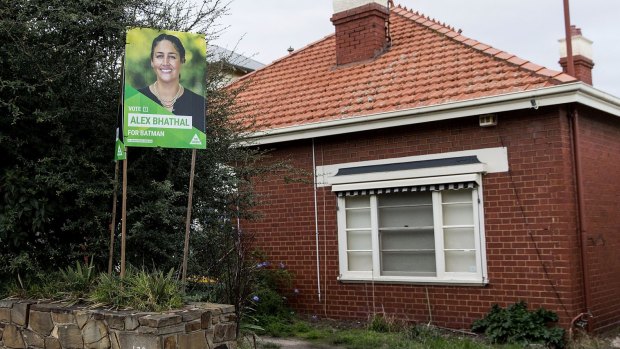 The Greens placard outside the house owned by Labor powerbroker David Feeney.