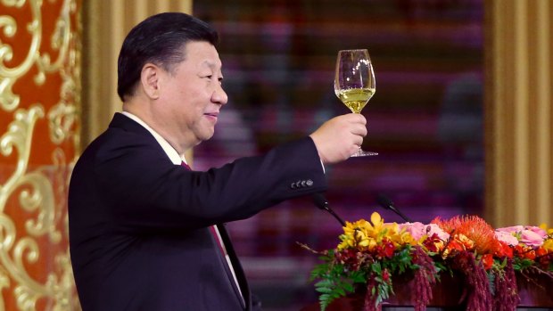 China's President Xi Jinping delivers a toast at a state dinner at the Great Hall of the People in Beijing.