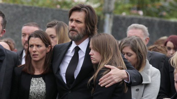 Jim Carrey and daughter Jane attend the funeral of Cathriona White on October 10.