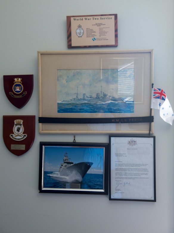 Memorabilia hangs in the Ballarat home of HMAS Perth survivor David Manning.