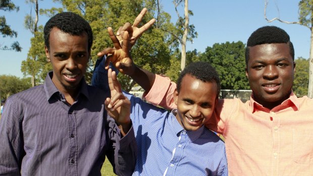 Kuraby resident Abshir Mohamed from Somalia, Inala resident Abdi Muhumed, and Sunnybank resident Mohamed Beauogui at the World Refugee Day celebrations at Annerley.