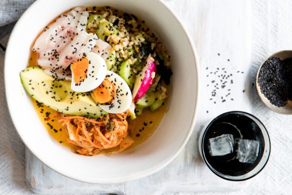 Poke rice salad bowl with kimchi. 