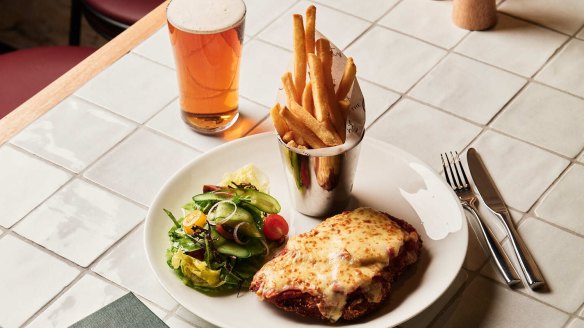The chicken parmigiana from the public bar menu is among the pub classics on offer.