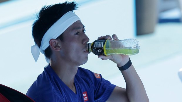 Fluid performance: Japan's Kei Nishikori takes a well-earned break.