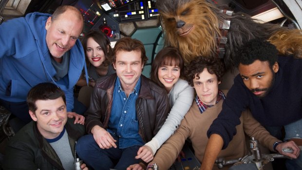 Christopher Miller (bottom left) and Phil Lord (second from the right) are no longer directing the next standalone Star Wars film. 