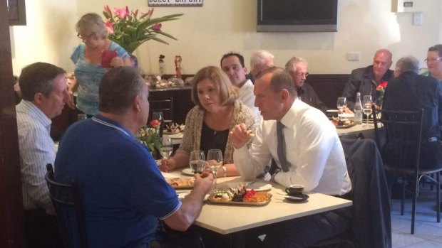 While dining at a coffee shop in Brisbane Mr Abbott said his focus was on budget bills.