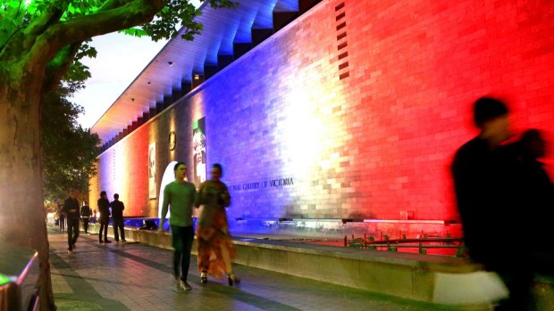 Walls of the NGV lit up in support of the Paris terror victims.
