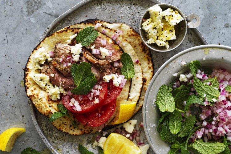 Souvlaki-meets-taco: Lamb and feta wraps with mint salsa.