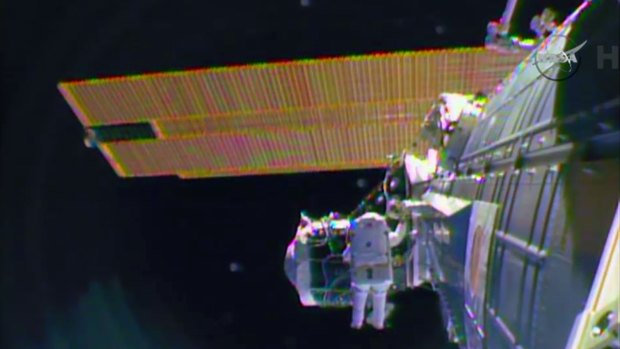 A sense of urgency: Astronaut Barry "Butch" Wilmore on a spacewalk outside the International Space Station in preparation for the arrival in July of the international docking port for the Boeing and Space-X commercial crew vehicles. 