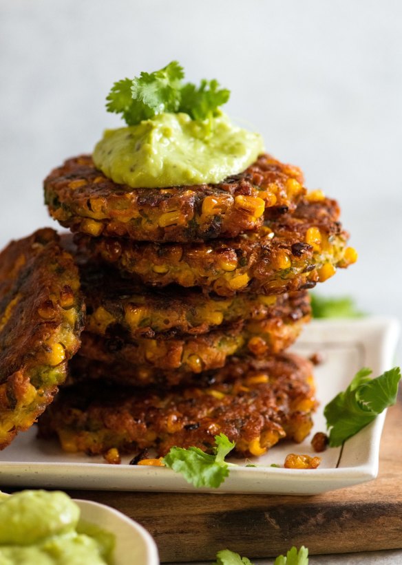 Crispy corn fritters with avocado cream.