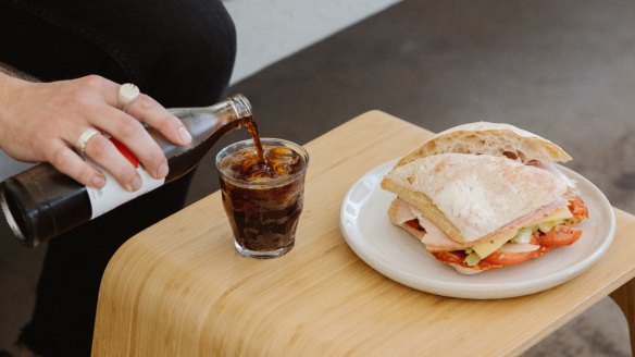 Salami, leg ham, swiss cheese, lettuce, tomato, mustard pickle and mayo on ciabatta with smoked cola at Effie's, Balgowlah.