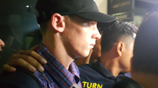 Jamie Murphy leaves Kuta police station after his release.