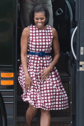 On the campaign trail, 2012. Accessibly chic in this affordable cotton ASOS dress. She was also praised for a yellow floral shift from US chain store Talbots.