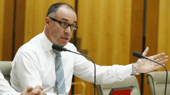National Australia Bank chief executive Andrew Thorburn (right) and chief operating officer Antony Cahill have faced a testy hearing at Parliament.