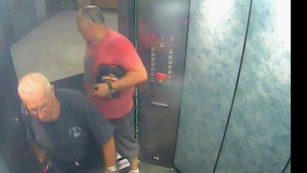 Glen McNamara, holding a six pack of James Boags under his arm, with Roger Rogerson in the lift of McNamara's Cronulla apartment on May 20, 2014 - the day Jamie Gao was killed.