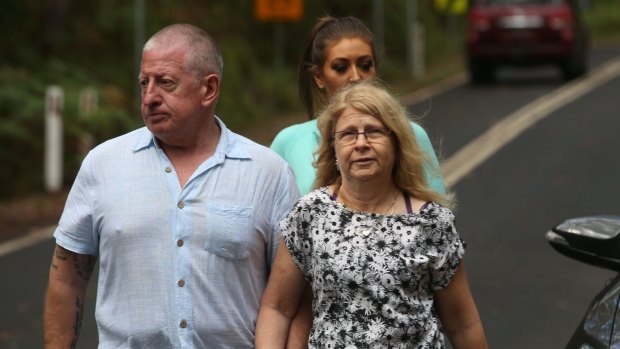 Parents Faye and Mark Leveson attend the scene where police are searching for their son Matthew.