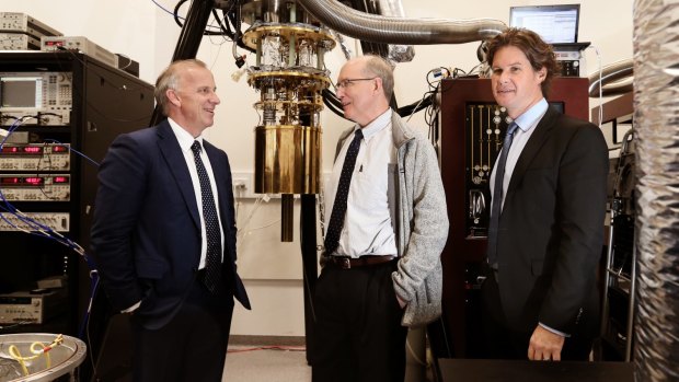 University of Sydney vice-chancellor Michael Spence (left) with Microsoft's Norm Whitaker (centre) and Professor David Reilly in Reilly's laboratory at the Nanoscience Hub.