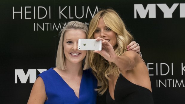 Ka-ching: Supermodel Heidi Klum's selfie with a fan in Melbourne last week would likely draw the attention of marketers.
