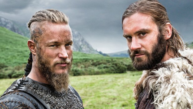 Travis Fimmel as Ragnar Lothbrok, left, and his on-screen brother, Rollo, played by Clive Standen, star in <i>Vikings</i>.