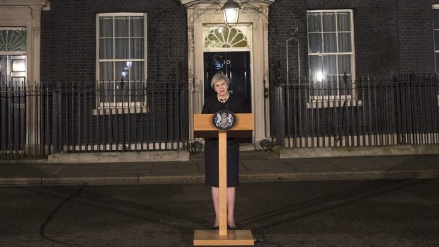 British Prime Minister Theresa May makes a statement in Downing street following the Wednesday terrorist incident in Westminster.
