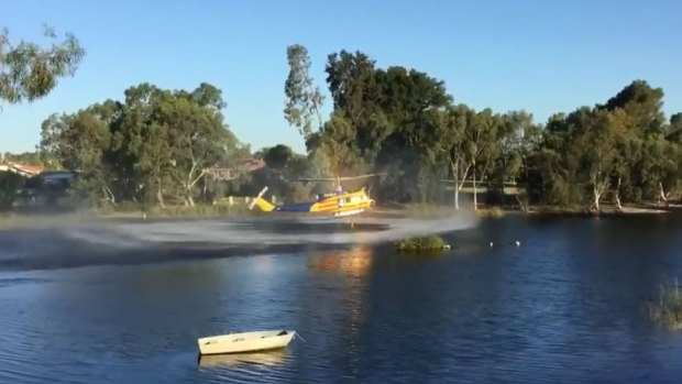 A resident captured the moment waterbombers visited nearby water supplies.