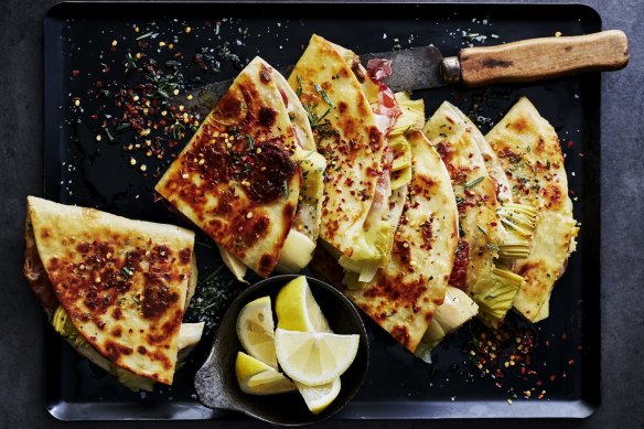 Piadina with prosciutto, marinated artichoke, chilli and rosemary  