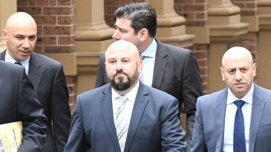 From left, lawyer Nick di Girolamo, Moses Obeid, Eddie Obeid jnr, lawyer Tim Breene (back) and Paul Obeid at the Supreme Court last year.
