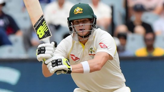 Australia's Steve Smith plays a shot against England during the fifth day of their Ashes cricket test match in Melbourne, Australia, Saturday, Dec. 30, 2017. (AP Photo/Andy Brownbill)