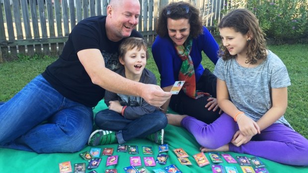Brisbane man Ian Horchner has collected more than 6000 Sunny Queen egg stickers. Daughter Charli and son Indi love the hobby but wife Leanne isn't so sure.