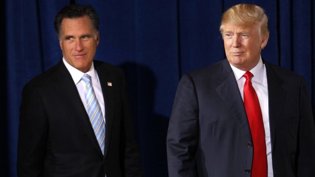 Former Massachusetts Gov. Mitt Romney, and Donald Trump, arrive for a news in Las Vegas in 2012 where Trump endorsed Romney. 