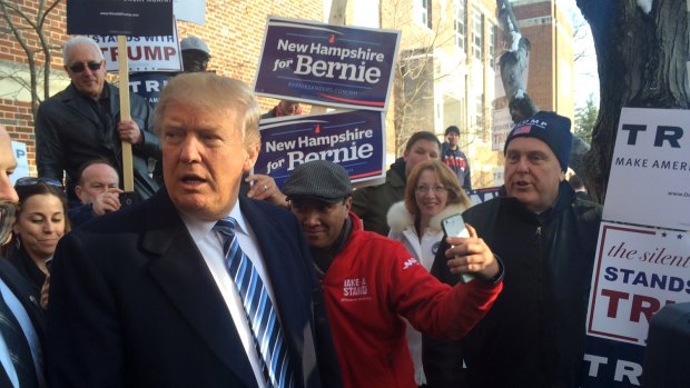 Donald Trumps greets voters at Webster Elementary School in Manchester, NH. 